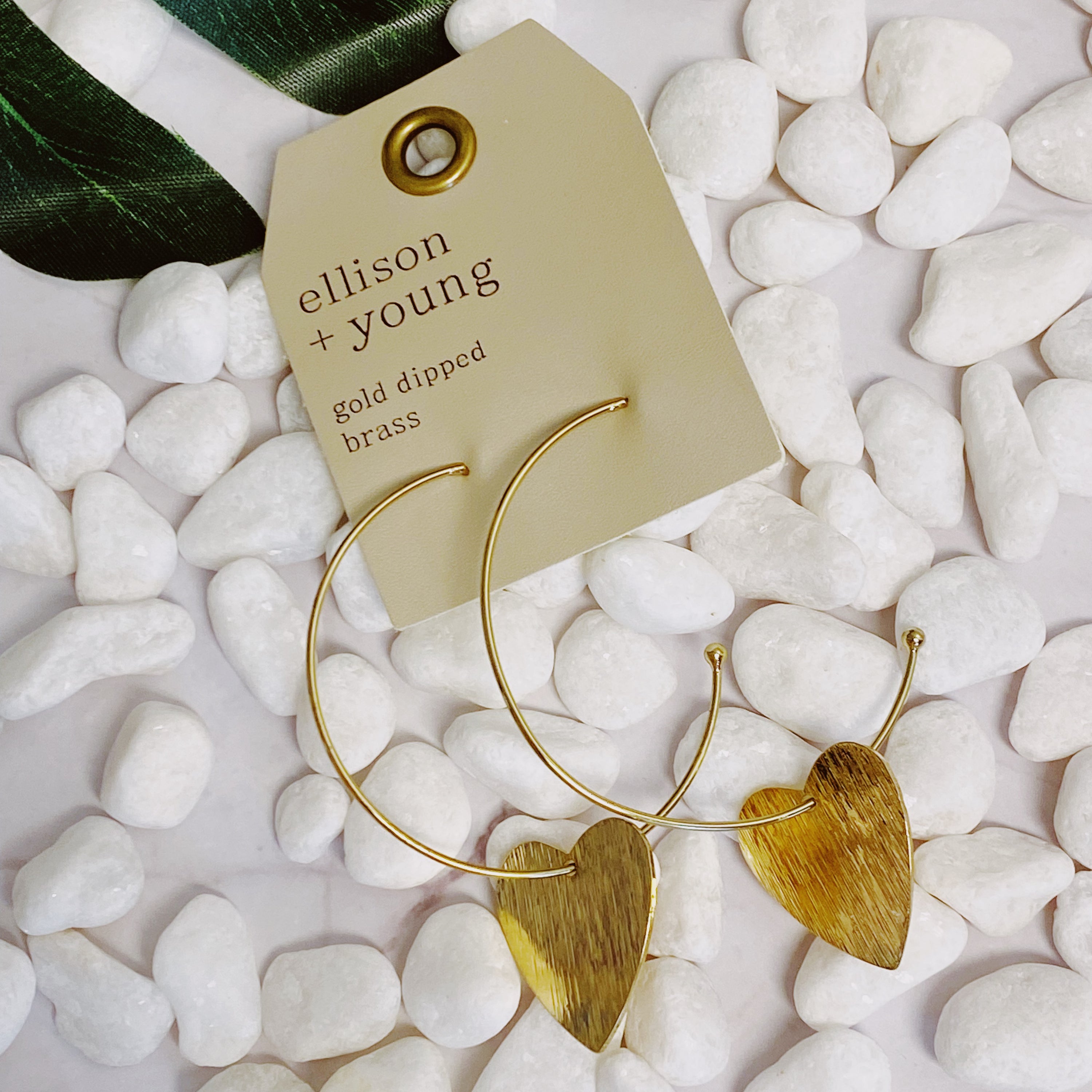 Stylish No Games Heart Hoop Earrings featuring a brushed texture heart pendant on a slim gold plated brass hoop.