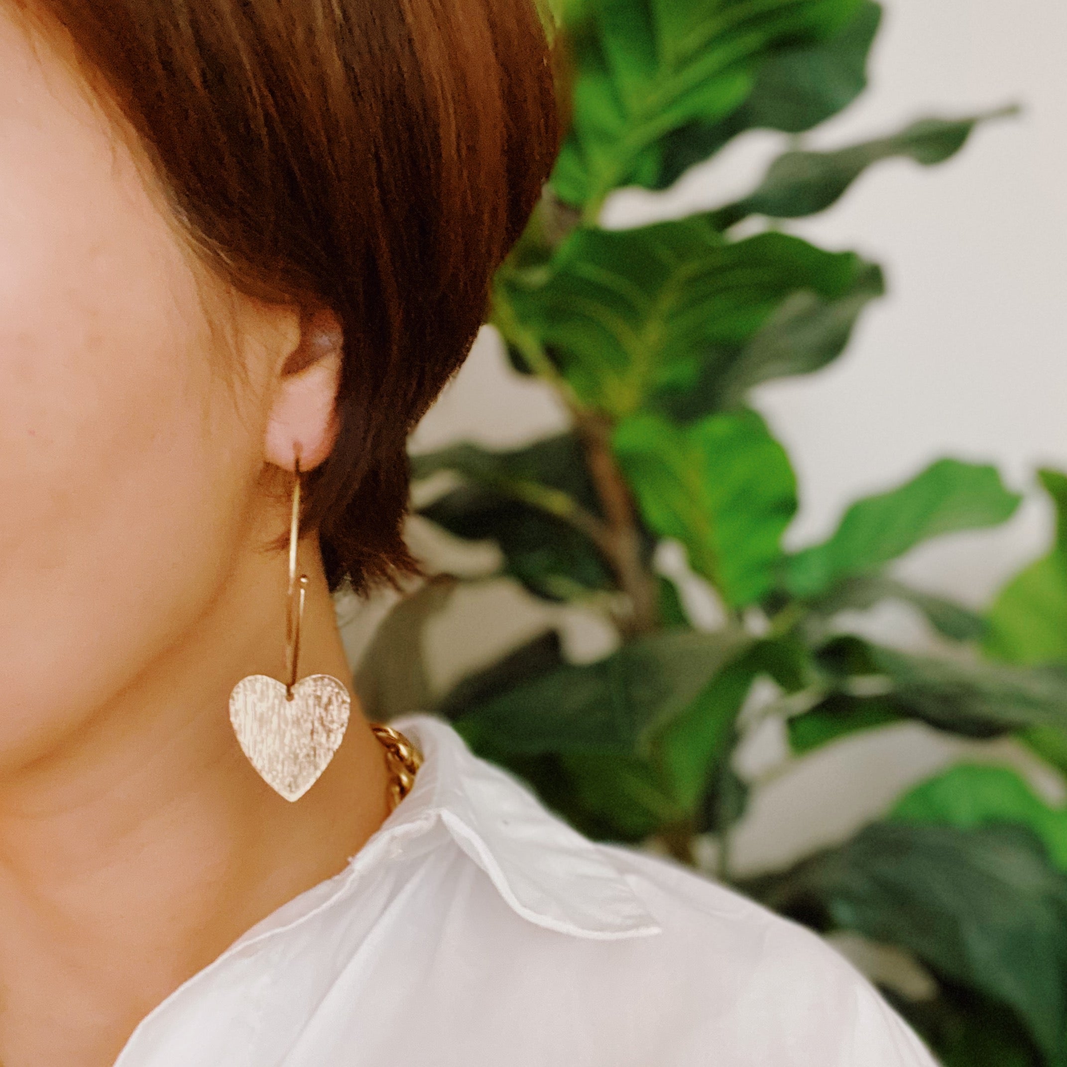 Stylish No Games Heart Hoop Earrings featuring a brushed texture heart pendant on a slim gold plated brass hoop.