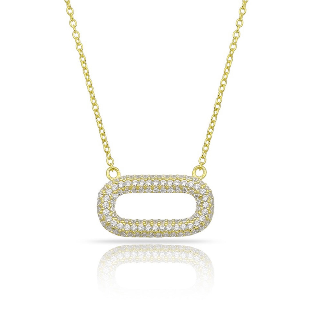 NOOR Oval Necklace featuring cubic zirconias on a yellow gold plated sterling silver chain, elegantly displayed.