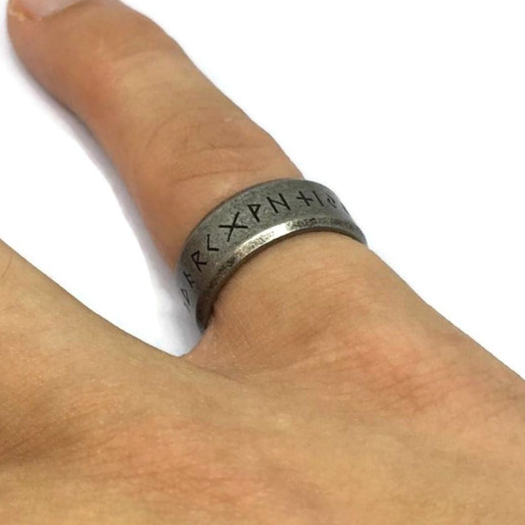 Nordic Inscription Band Ring made of stainless steel, featuring intricate designs and a polished finish, suitable for unisex wear.