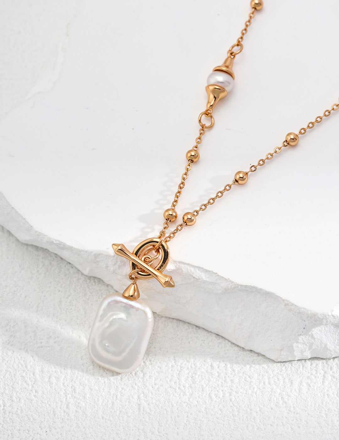 Ocean Whisper Square Pearl Pendant Necklace featuring a unique square-shaped pearl on a 43cm pure silver chain, showcasing elegance and sophistication.