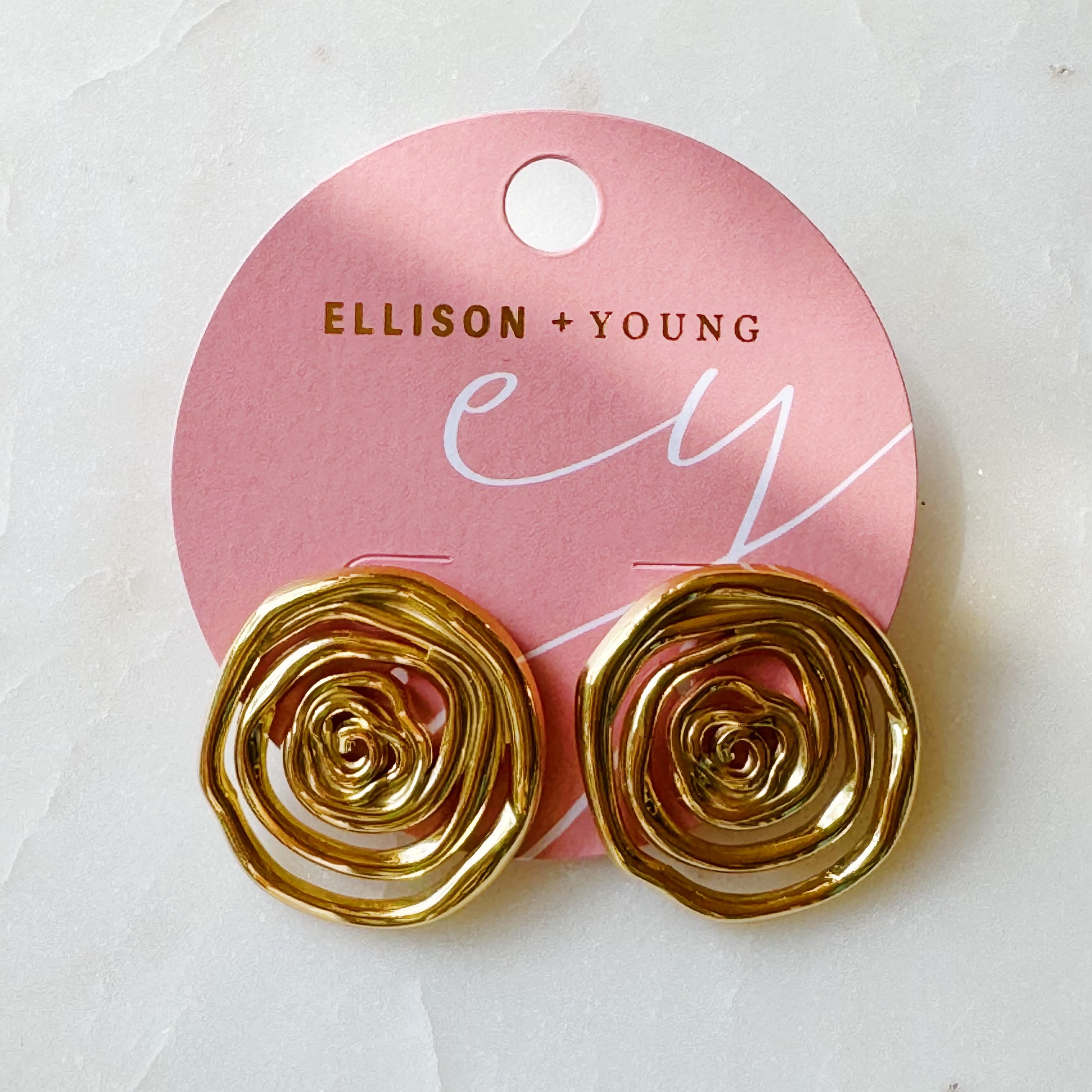 Elegant Oh My Gold Swirl Stud Earrings featuring a unique swirl design in 18k gold plating, perfect for any outfit.