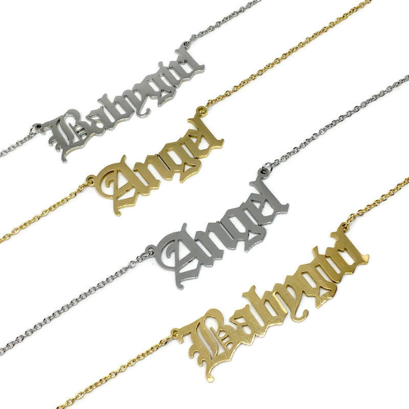 Old English Babygirl Necklace in stainless steel with a stylish pendant, showcasing its elegant design and adjustable chain.