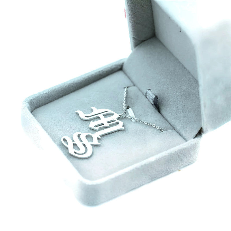 Old English Double-Initial Necklace in stainless steel with customizable initials, showcasing its elegant design and durability.