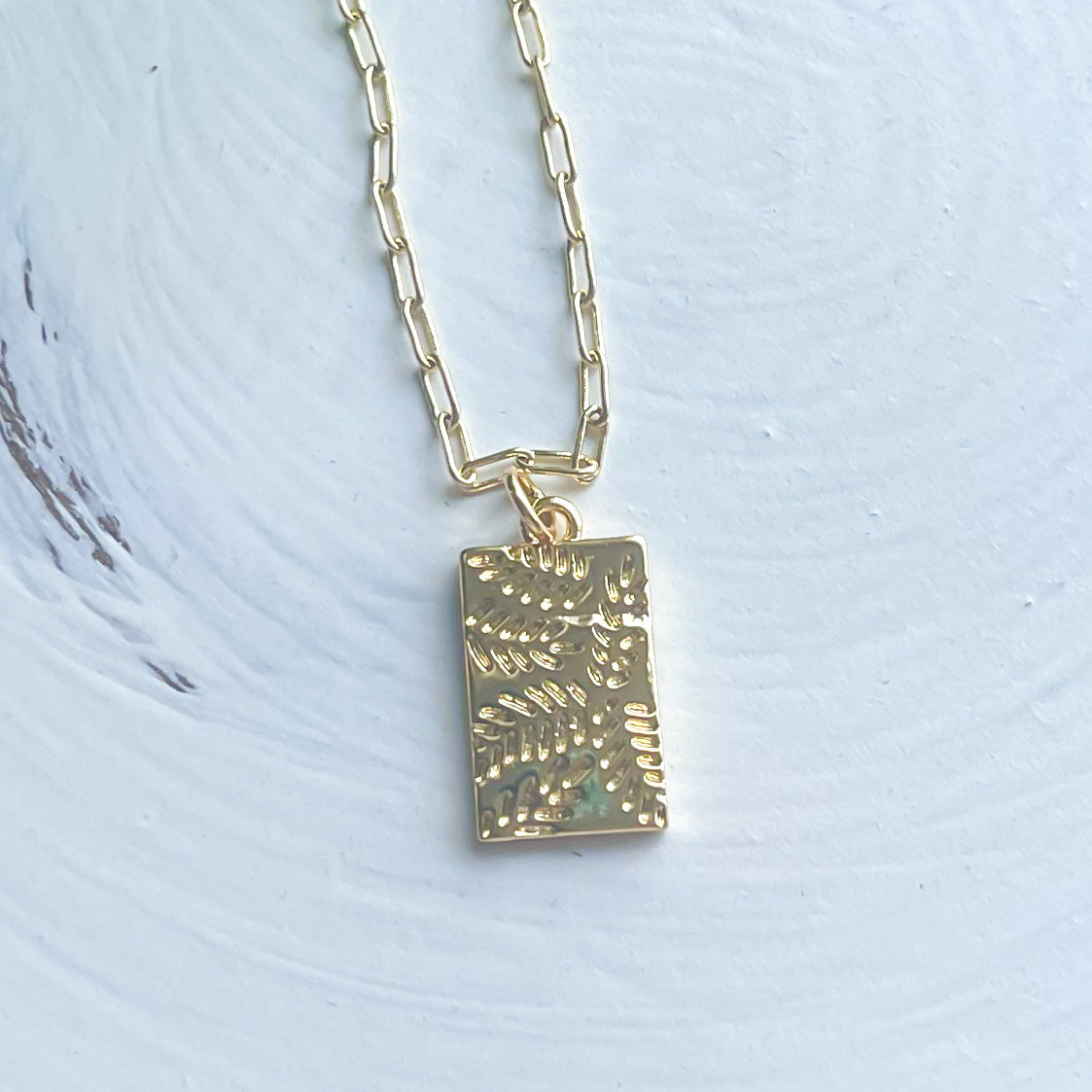 Elegant Olive Leaves of Peace Necklace featuring a delicate olive leaf pendant on a gold-filled chain.