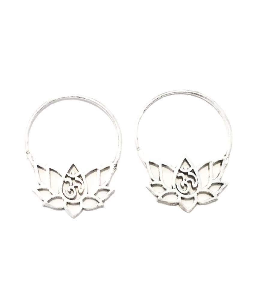 A pair of handcrafted Om Lotus Flower Earrings featuring a lotus design with the Om symbol in the center, made from brass and silver.