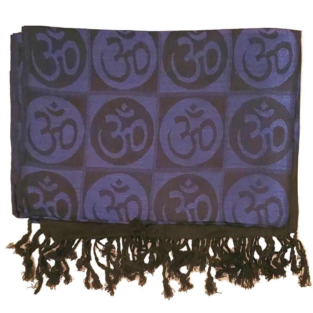 A beautifully handwoven scarf featuring the Om meditation symbol with braided tassels, showcasing its intricate design and vibrant colors.