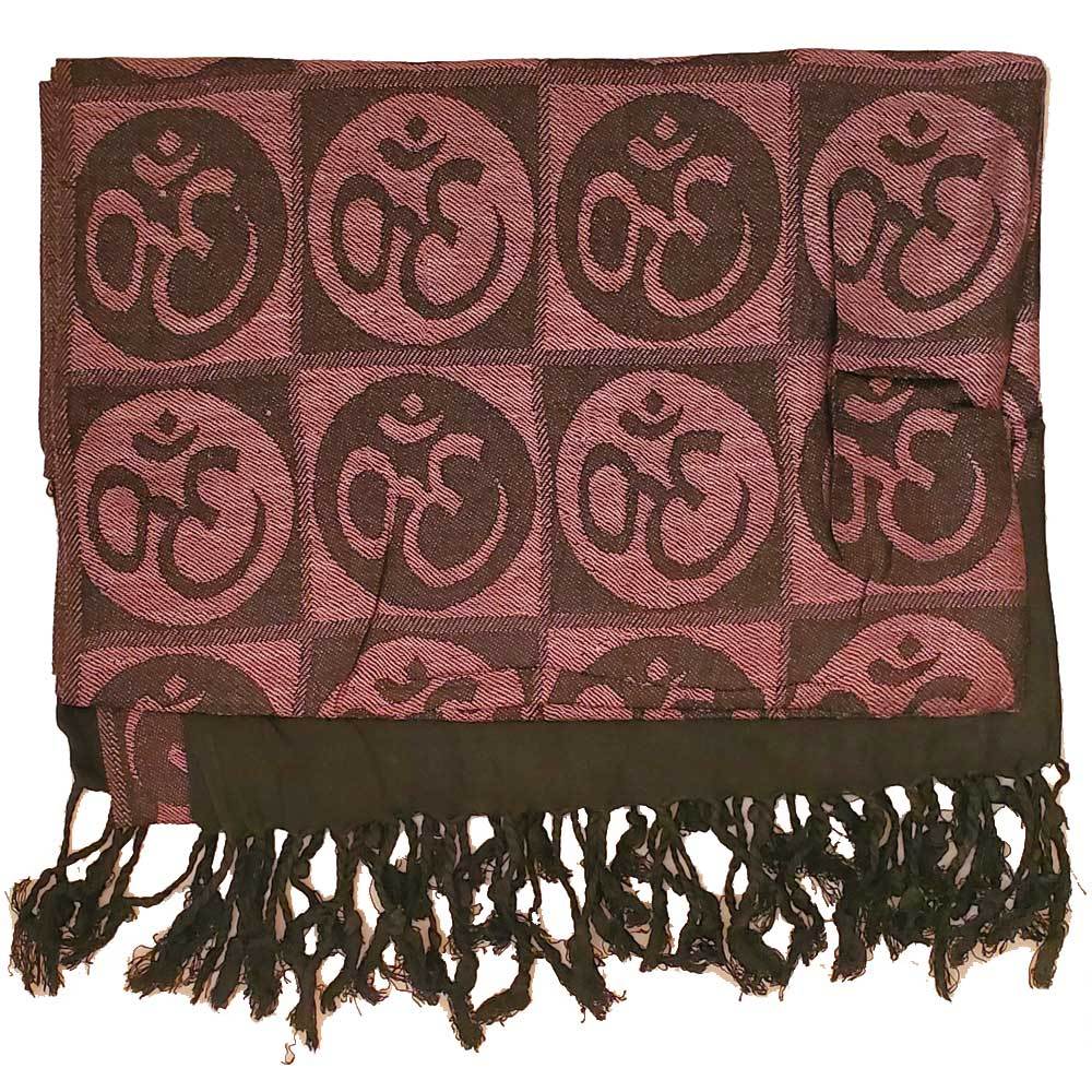 A beautifully handwoven scarf featuring the Om meditation symbol with braided tassels, showcasing its intricate design and vibrant colors.