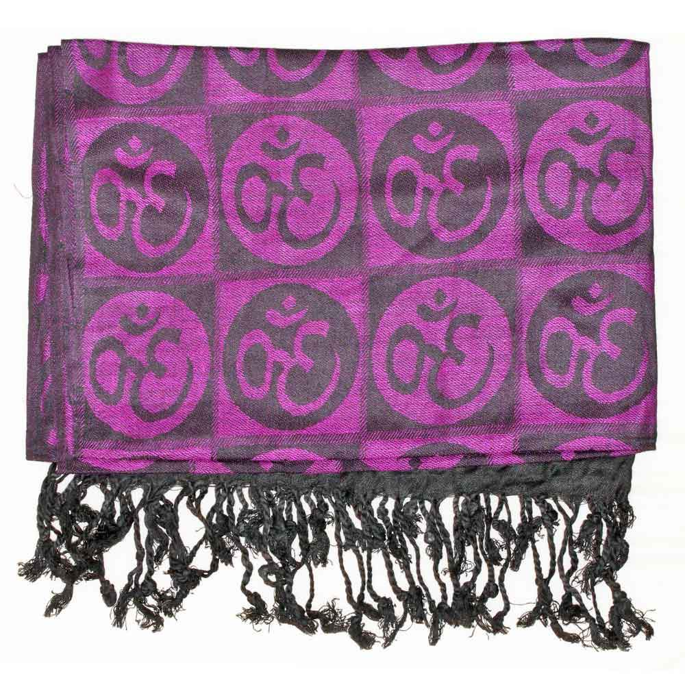 A beautifully handwoven scarf featuring the Om meditation symbol with braided tassels, showcasing its intricate design and vibrant colors.