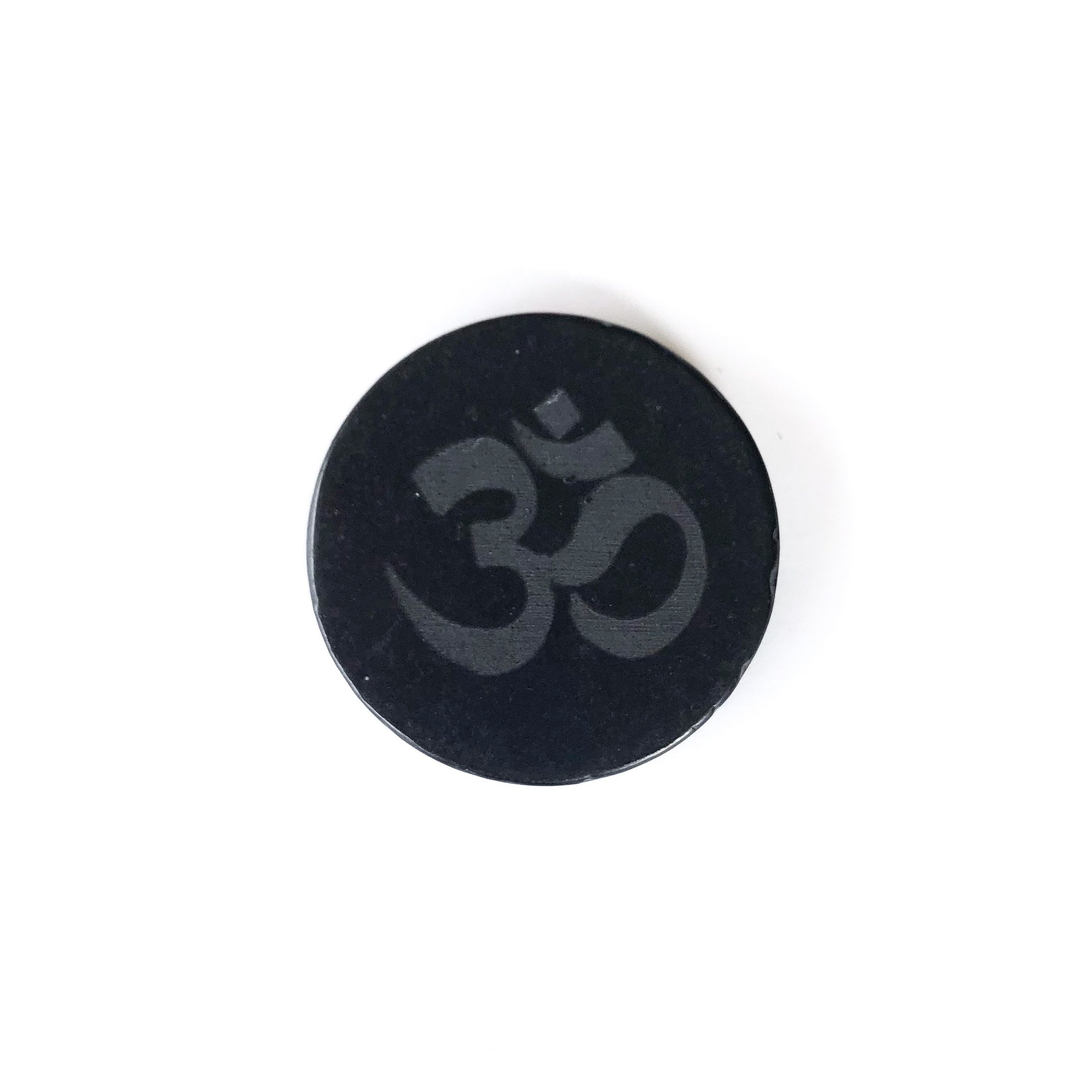 Om Shungite Cell Phone Sticker featuring the sacred Om symbol, made from genuine Karelian shungite, 30mm in diameter.