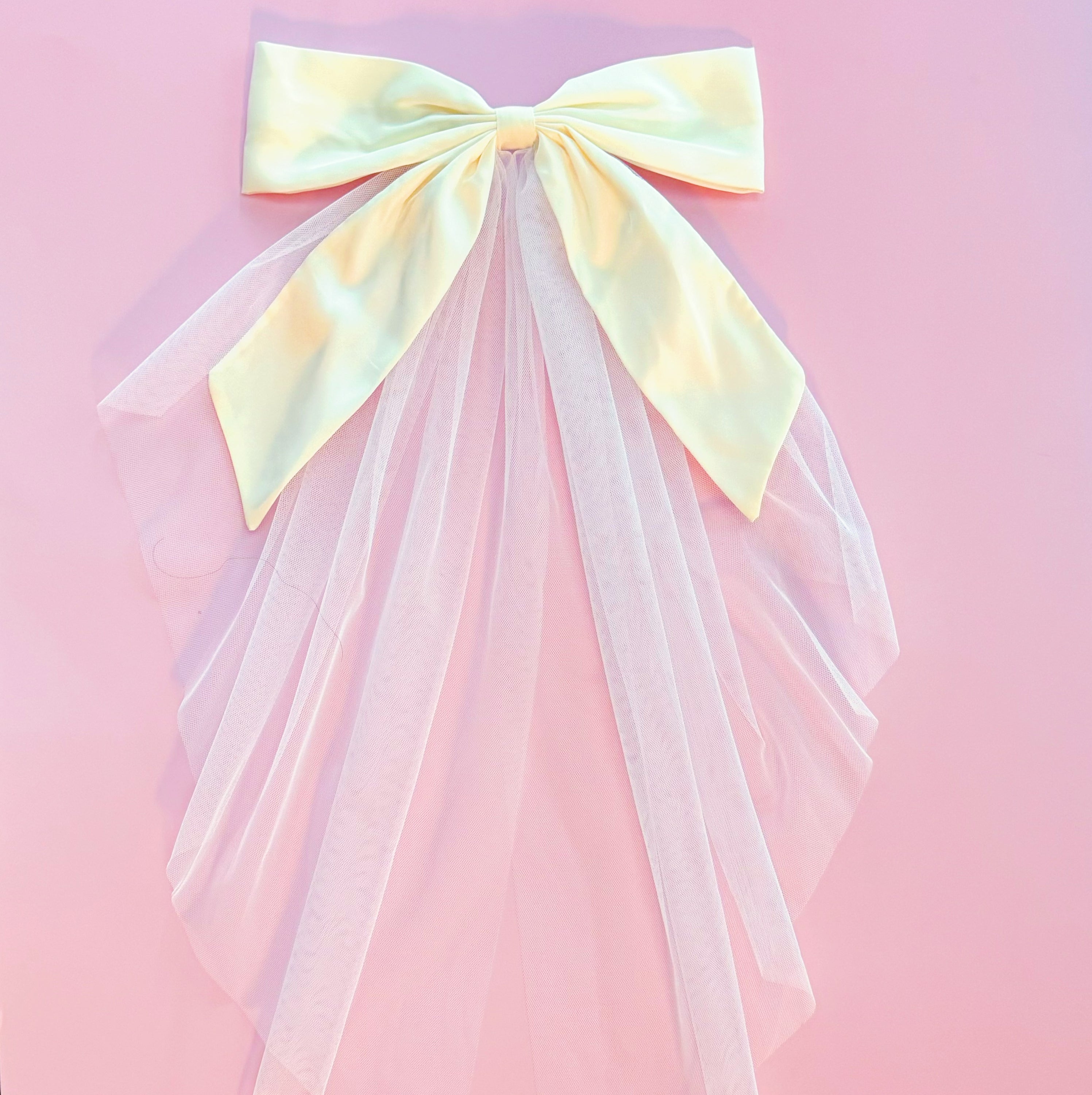 OMG Beauty Veil Bow Hair Clip featuring a satin bow and tulle veil, perfect for elegant hairstyles.