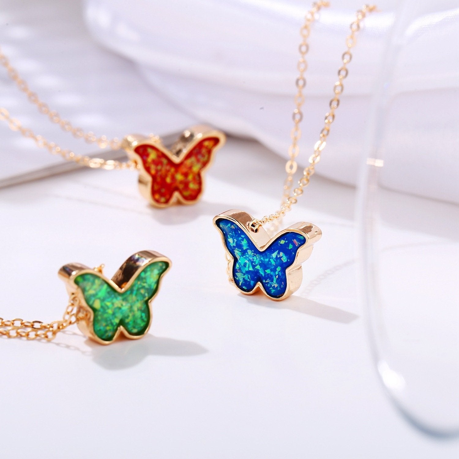 Opal Created Butterfly-Turquoise Necklace with 18K Gold Plating, featuring a delicate butterfly design and a link chain.