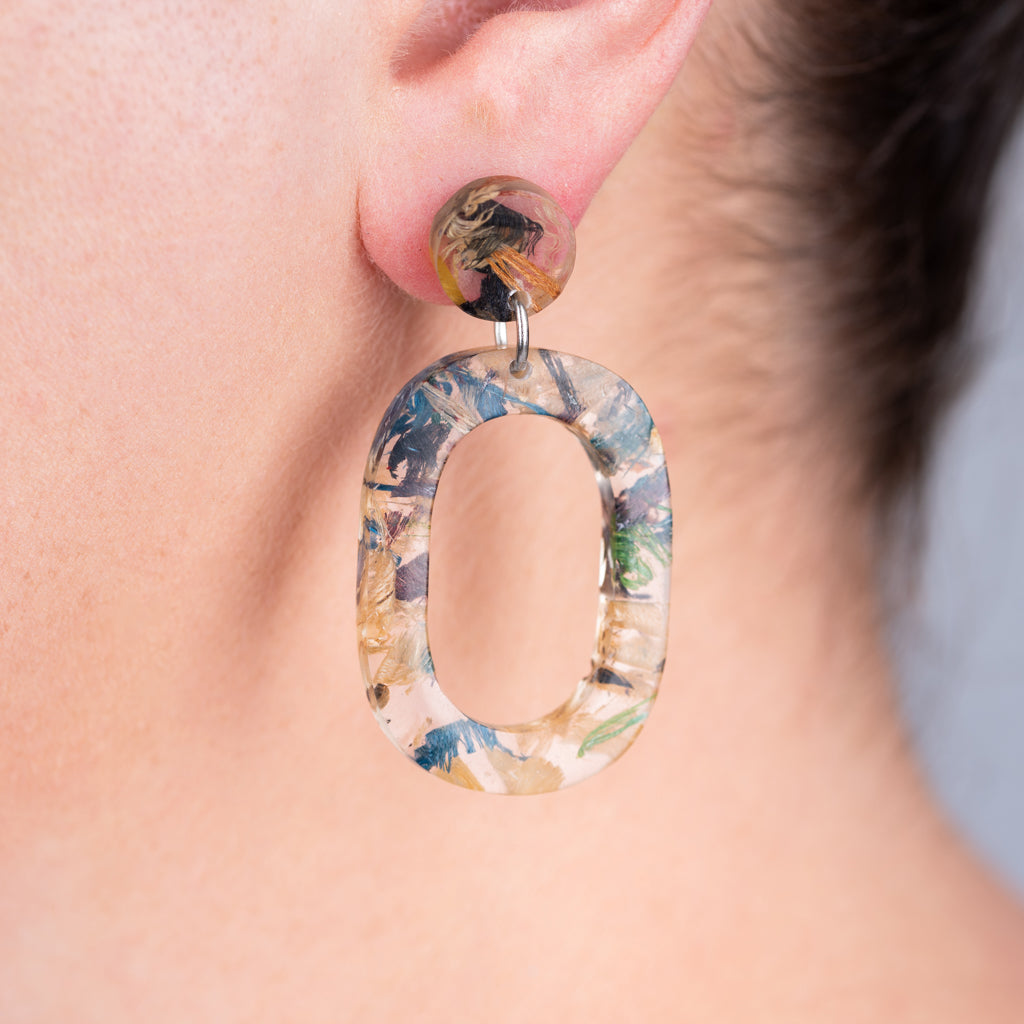 Colorful Opal Statement Resin Earrings made from recycled wood shavings and plant resin, showcasing unique patterns and eco-friendly design.