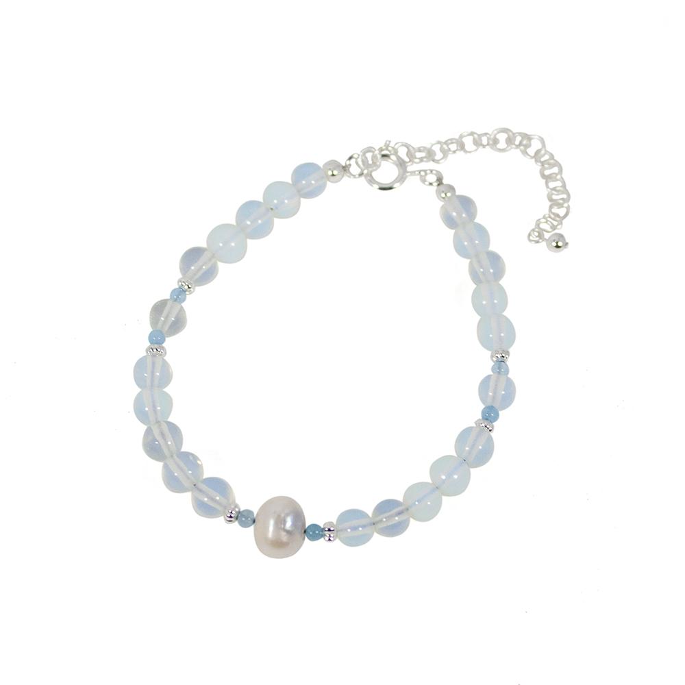 A beautiful bracelet featuring opalite beads and freshwater pearls, showcasing a shimmering design with a silver-plated brass closure.