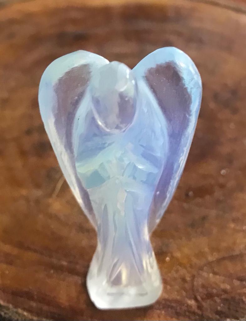 A 2-inch Opalite Crystal Angel figurine, showcasing its milky opalescent colors and delicate angelic features, perfect for emotional healing and decoration.