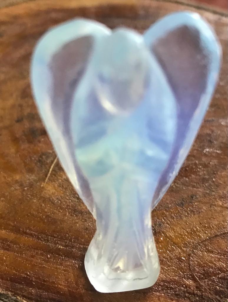 A 2-inch Opalite Crystal Angel figurine, showcasing its milky opalescent colors and delicate angelic features, perfect for emotional healing and decoration.