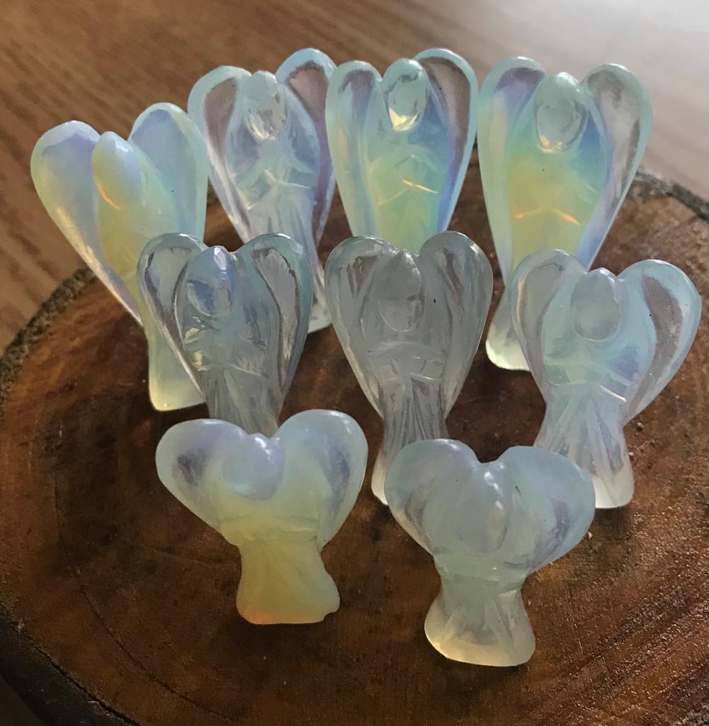 A 2-inch Opalite Crystal Angel figurine, showcasing its milky opalescent colors and delicate angelic features, perfect for emotional healing and decoration.