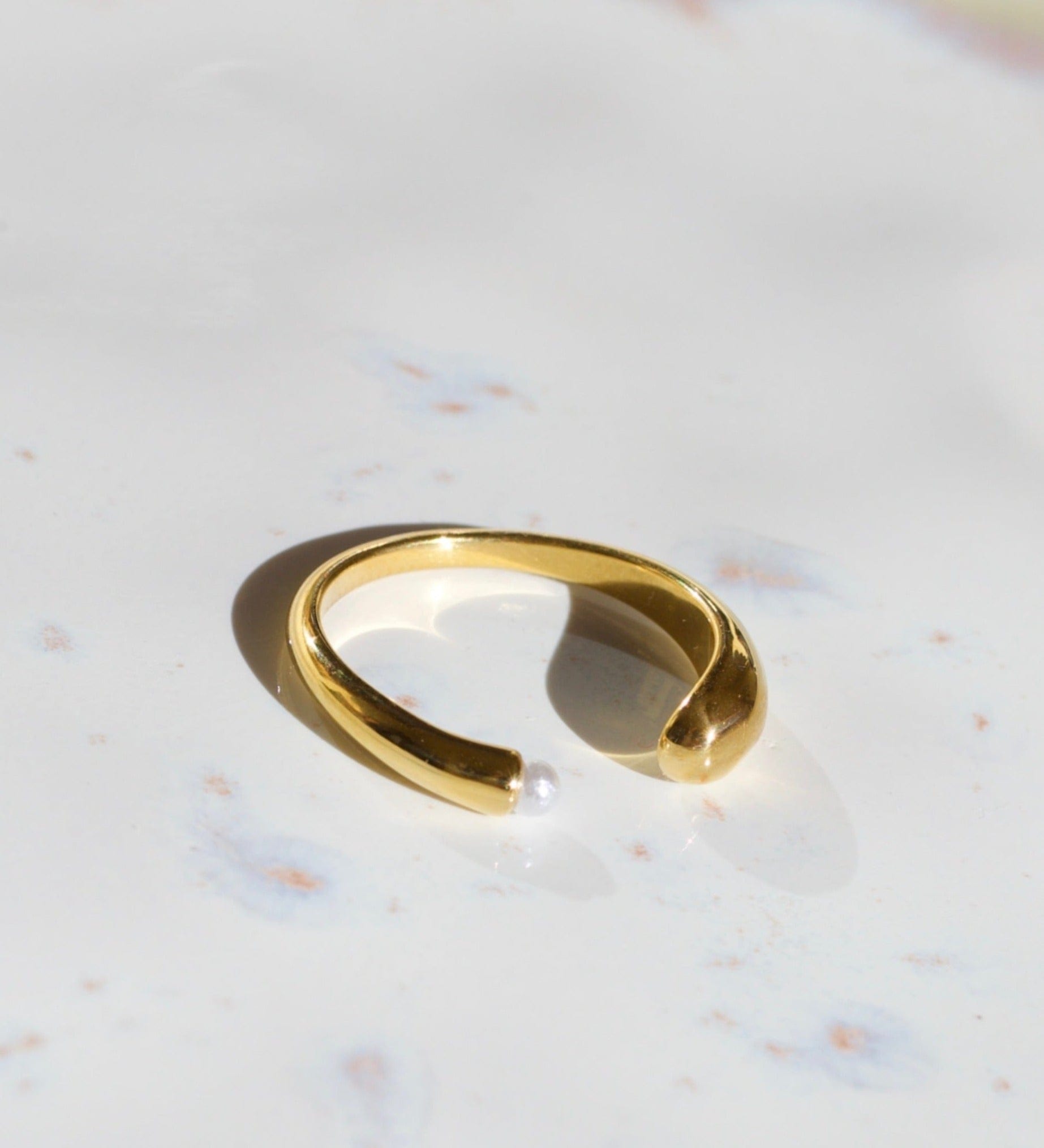 Open Gold Pearl Ring featuring a chunky asymmetrical waterdrop design with a white shell pearl, crafted from stainless steel with 18K gold plating.