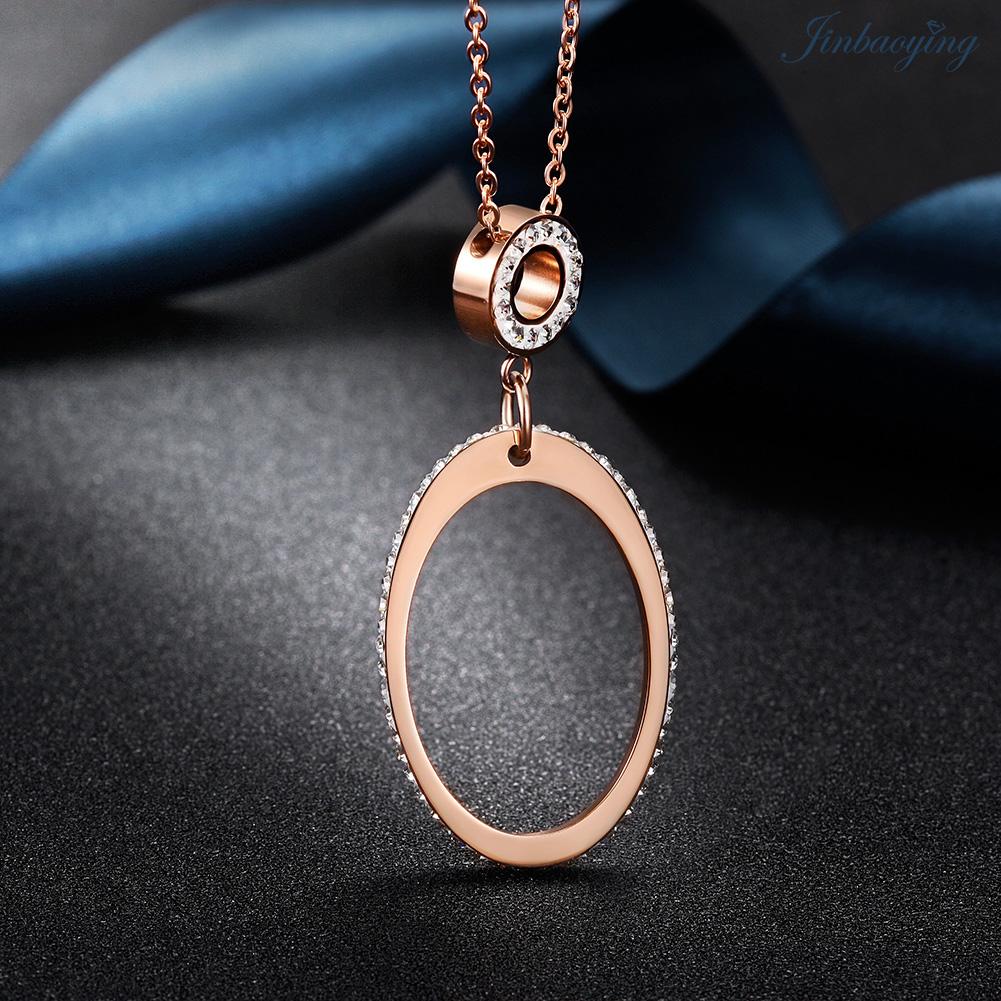 Open Oval CZ Necklace made of 316L surgical stainless steel with 14K gold PVD plating, featuring a sparkling cubic zirconia.