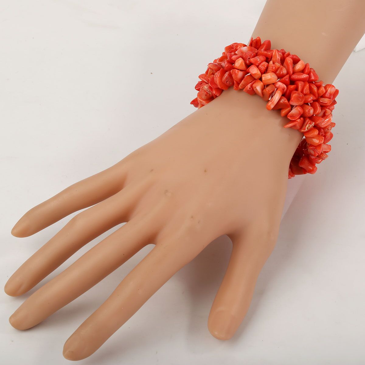 Orange Coral Stretch Cuff Bracelet featuring 5 layers of braided chunky design, handmade with precious coral stones, ideal for women and teen girls.