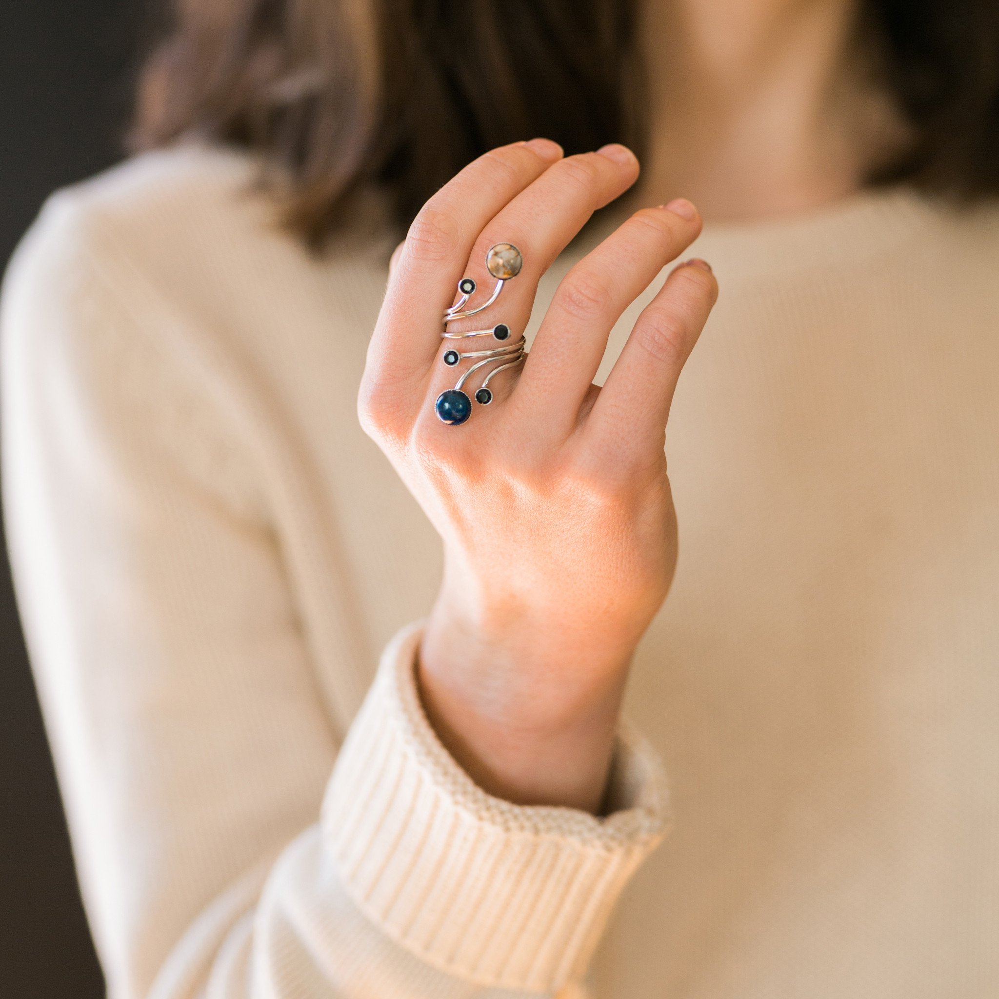 Orbit Ring featuring Azurite Malachite, Copper Calcite, and Black Spinel, handcrafted with a cosmic design.