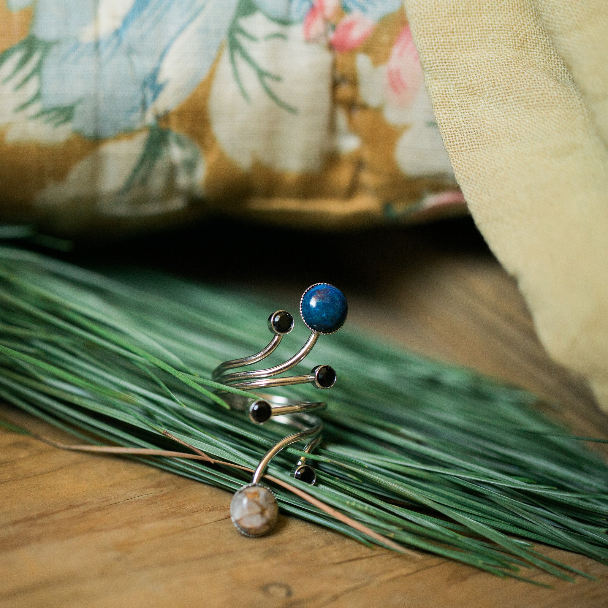 Orbit Ring featuring Azurite Malachite, Copper Calcite, and Black Spinel, handcrafted with a cosmic design.