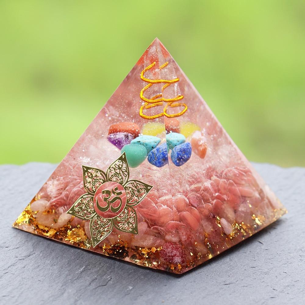 Clear Orgone Pyramid with Smelting Stone, featuring white quartz, copper, and gold foil, ideal for chakra balancing and energy cleansing.