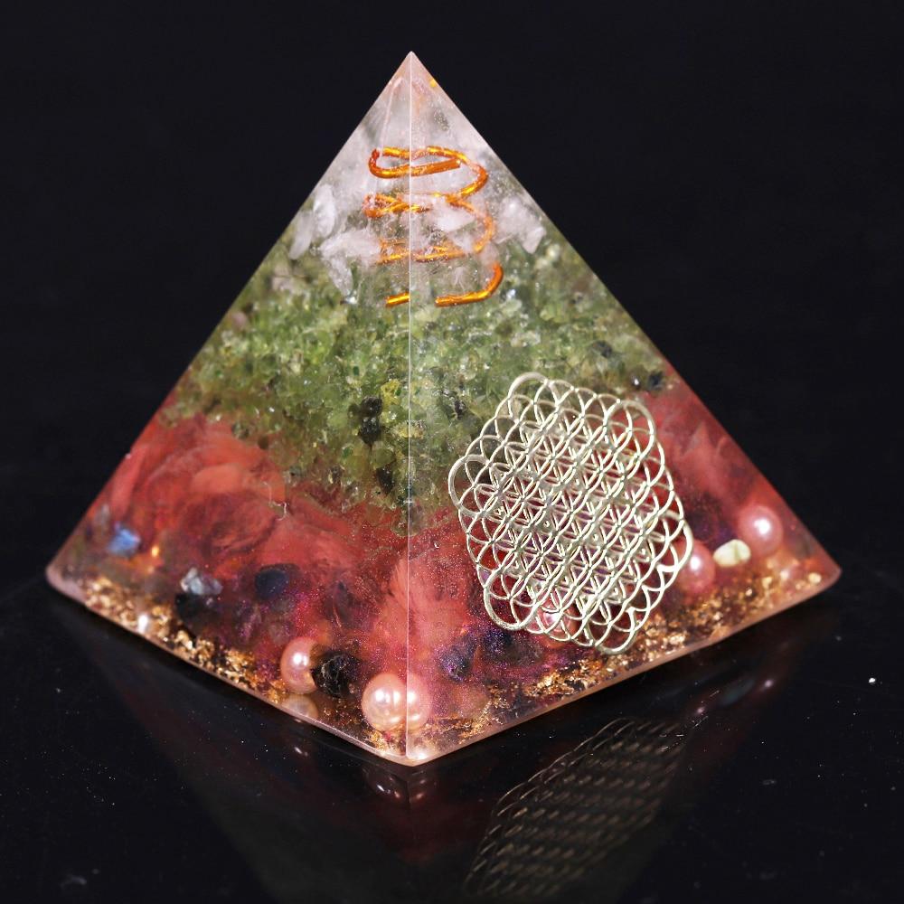 Handcrafted Orgonite Pyramid made of natural stones and metals, promoting love and positive energy, ideal for meditation and decoration.