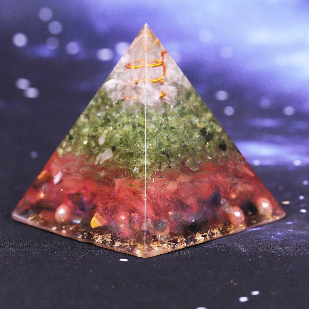 Handcrafted Orgonite Pyramid made of natural stones and metals, promoting love and positive energy, ideal for meditation and decoration.