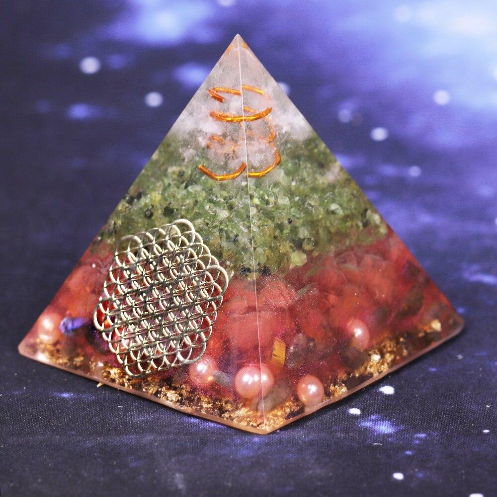 Handcrafted Orgonite Pyramid made of natural stones and metals, promoting love and positive energy, ideal for meditation and decoration.