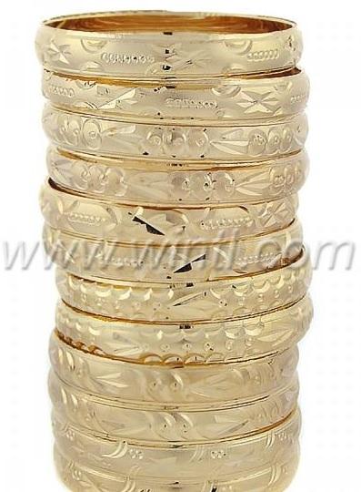 A dozen Oro Laminado Gold Filled Bangles 015 with diamond cut patterns, showcasing their elegant design and solid construction.