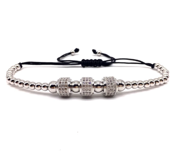 A stylish ORTHODOX Steel Bracelet featuring a silver overlay and shiny beading, perfect for casual and elegant looks.