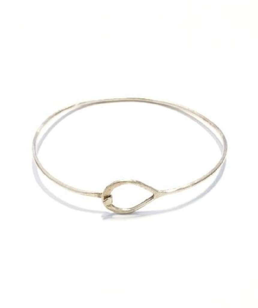 Elegant Oval Bangle Bracelet in silver and gold, showcasing its simplistic design and shiny finish.