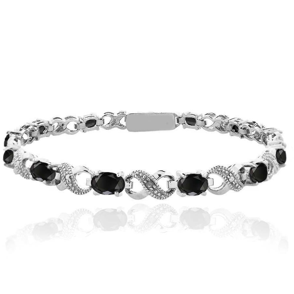 Oval Cut 6.00 CTTW Gemstone Infinity Shaped Bracelet in 18K White Gold, featuring simulated gemstones in an elegant infinity design.