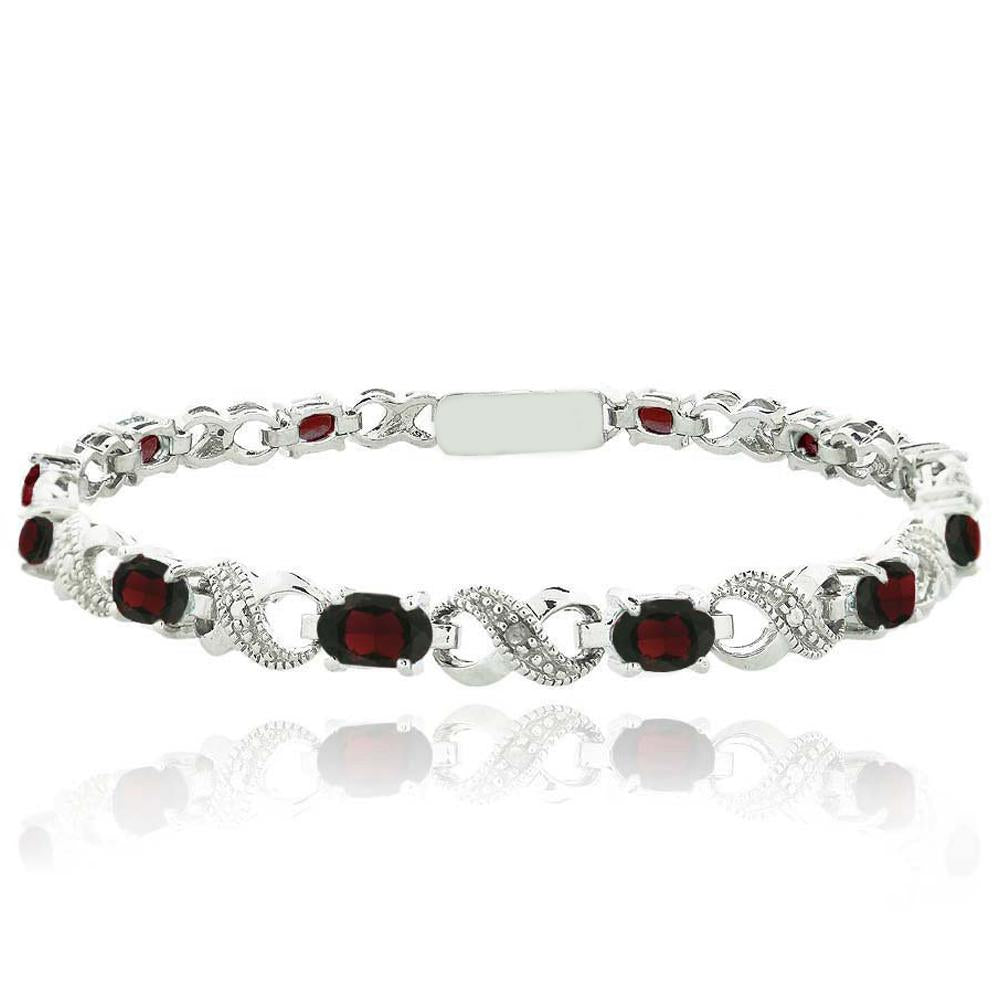 Oval Cut 6.00 CTTW Gemstone Infinity Shaped Bracelet in 18K White Gold, featuring simulated gemstones in an elegant infinity design.