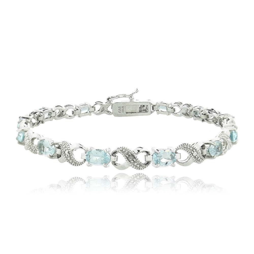 Oval Cut 6.00 CTTW Gemstone Infinity Shaped Bracelet in 18K White Gold, featuring simulated gemstones in an elegant infinity design.