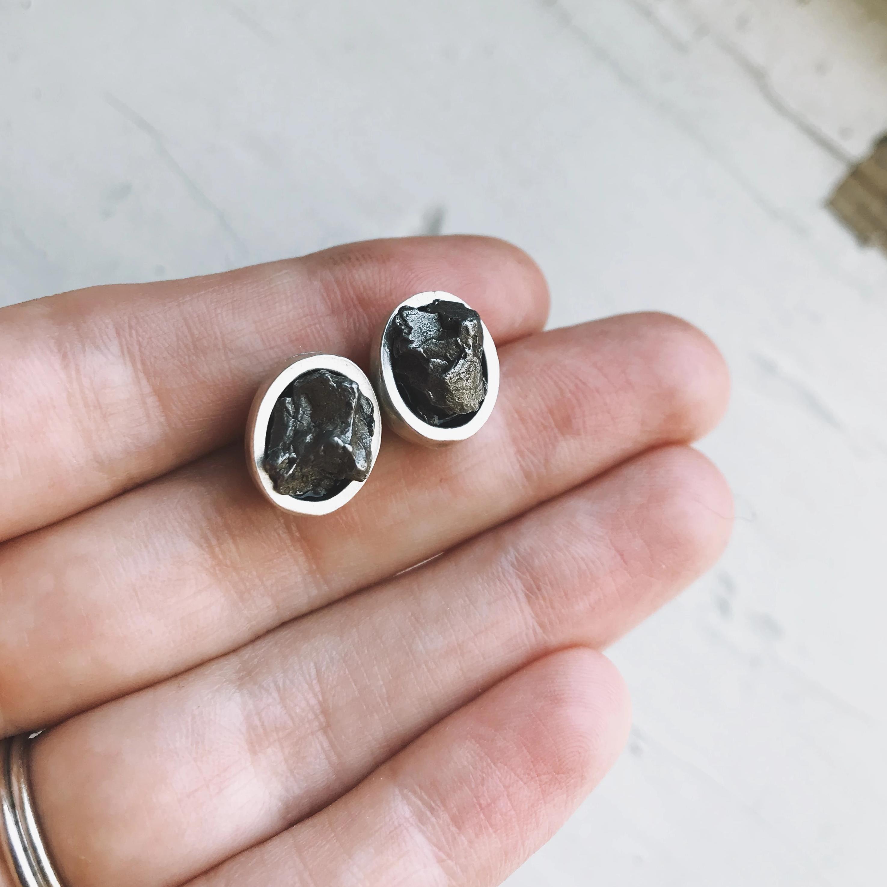 Oval Raw Meteorite Small Stud Earrings set in thick silver bezels, showcasing unique cosmic stones.