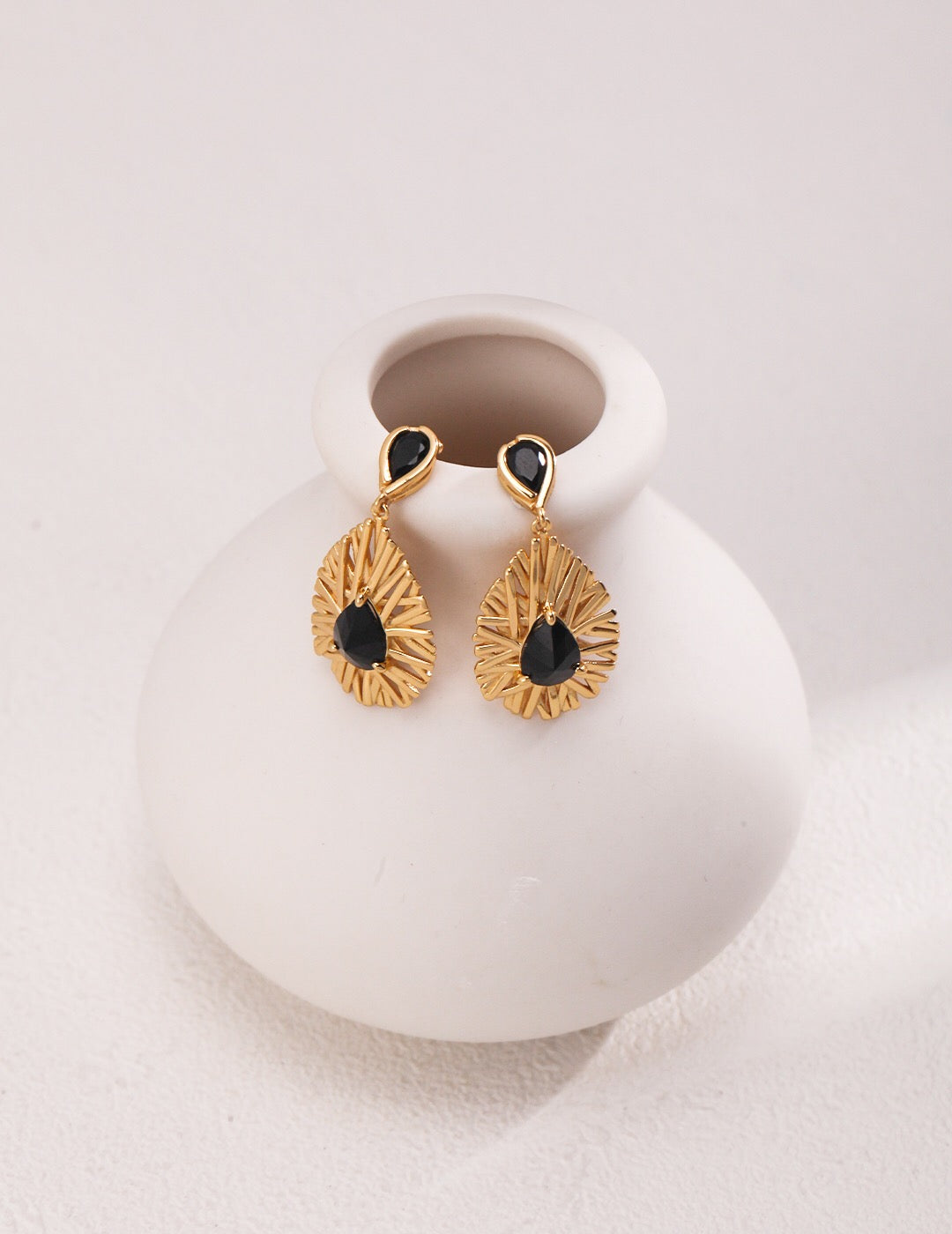 Elegant Palace Style Black Zircon Earrings featuring gold vermeil and black zircon stones, showcasing a sophisticated design.