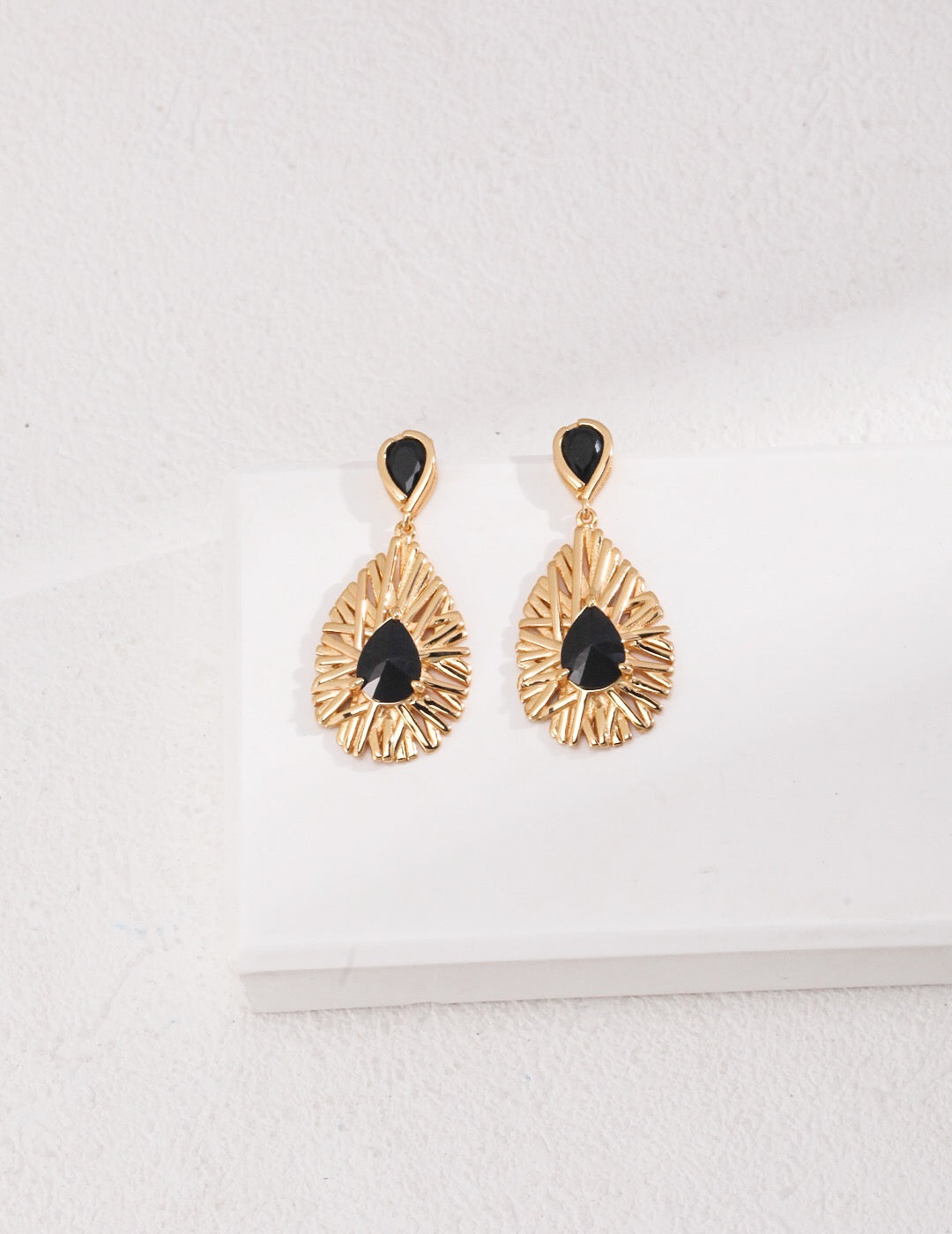 Elegant Palace Style Black Zircon Earrings featuring gold vermeil and black zircon stones, showcasing a sophisticated design.