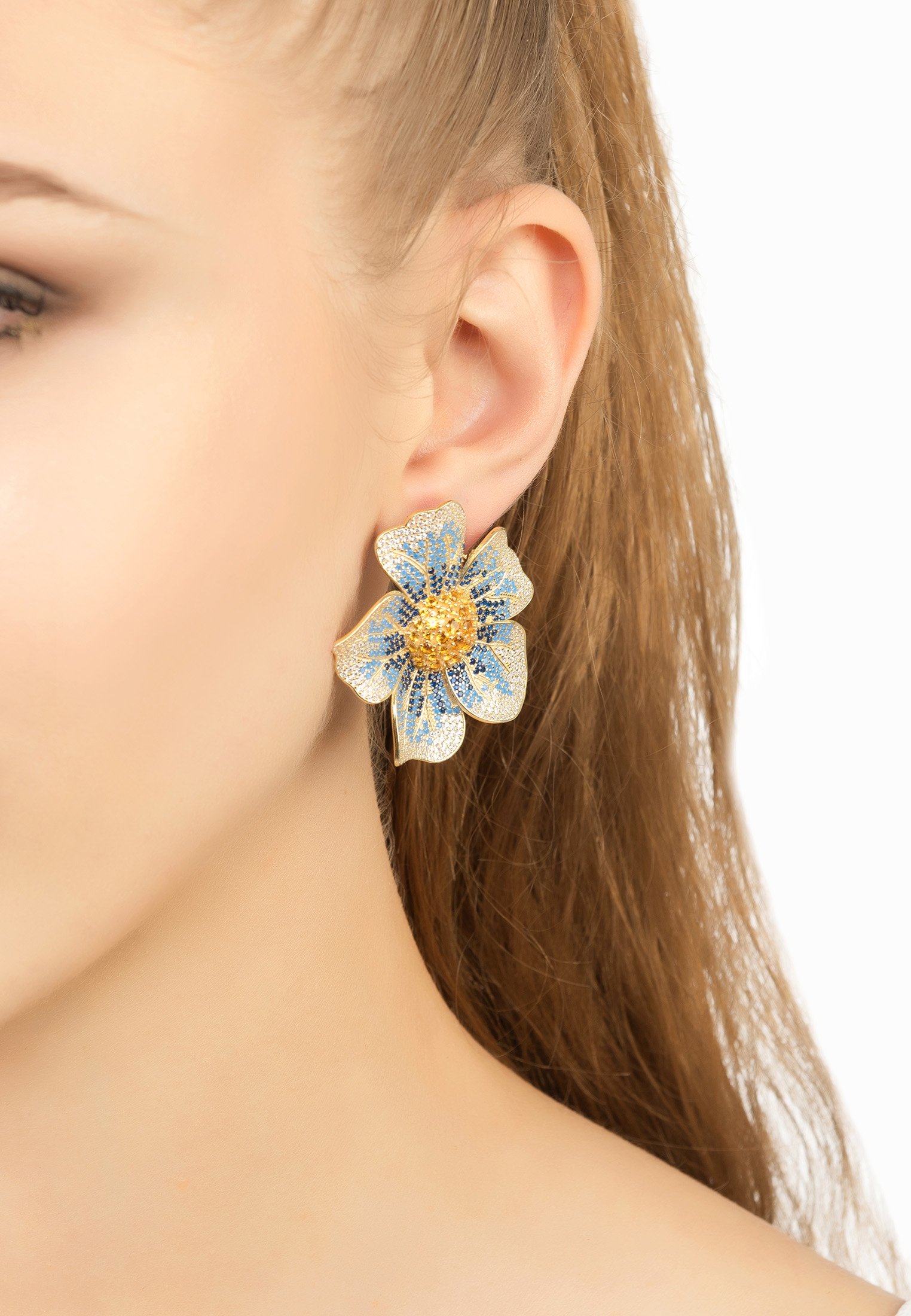 Elegant Pansy Flower Blue Earrings with cubic zirconia and gold finish, showcasing a vibrant floral design.