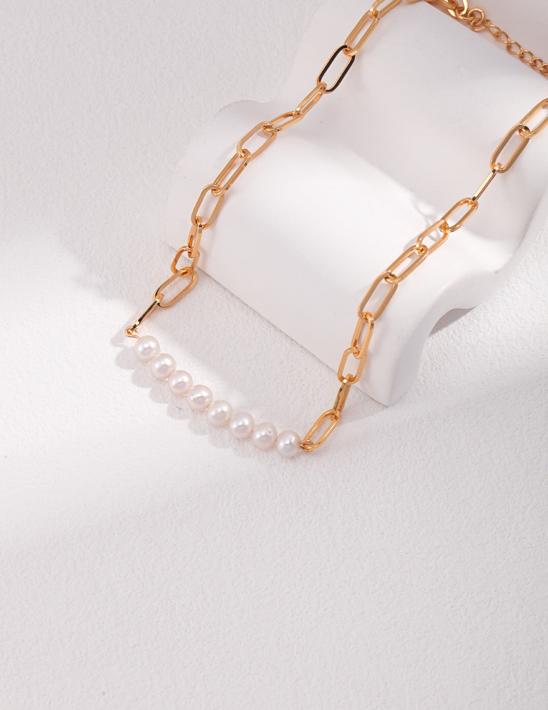 A beautiful Paperclip Chain Pearl Bead Necklace featuring natural pearls and gold vermeil, elegantly displayed on a soft background.