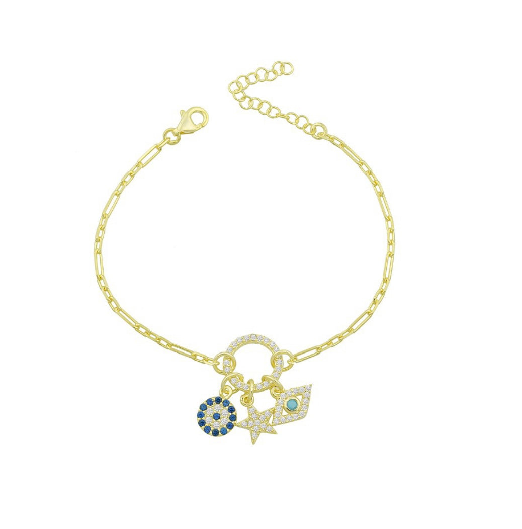 PARISA Charm Bracelet featuring three unique charms: a royal blue medallion, an evil eye, and a glittering star, crafted from 925 Sterling Silver with yellow gold plating.