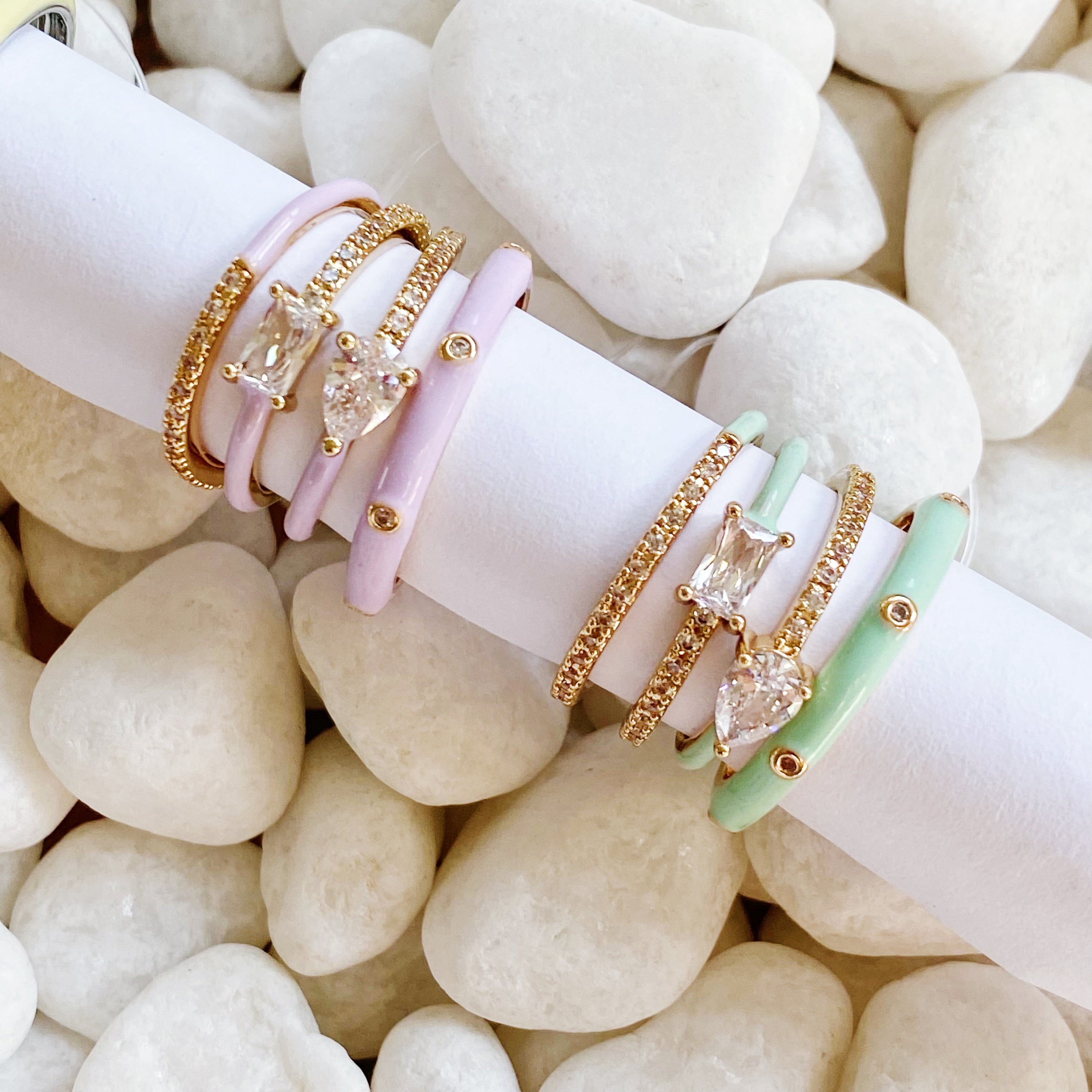 Pastel Glam Ring Set of 4 featuring colorful enamel and rhinestone details, showcasing three size 5 rings and one size 7 ring.