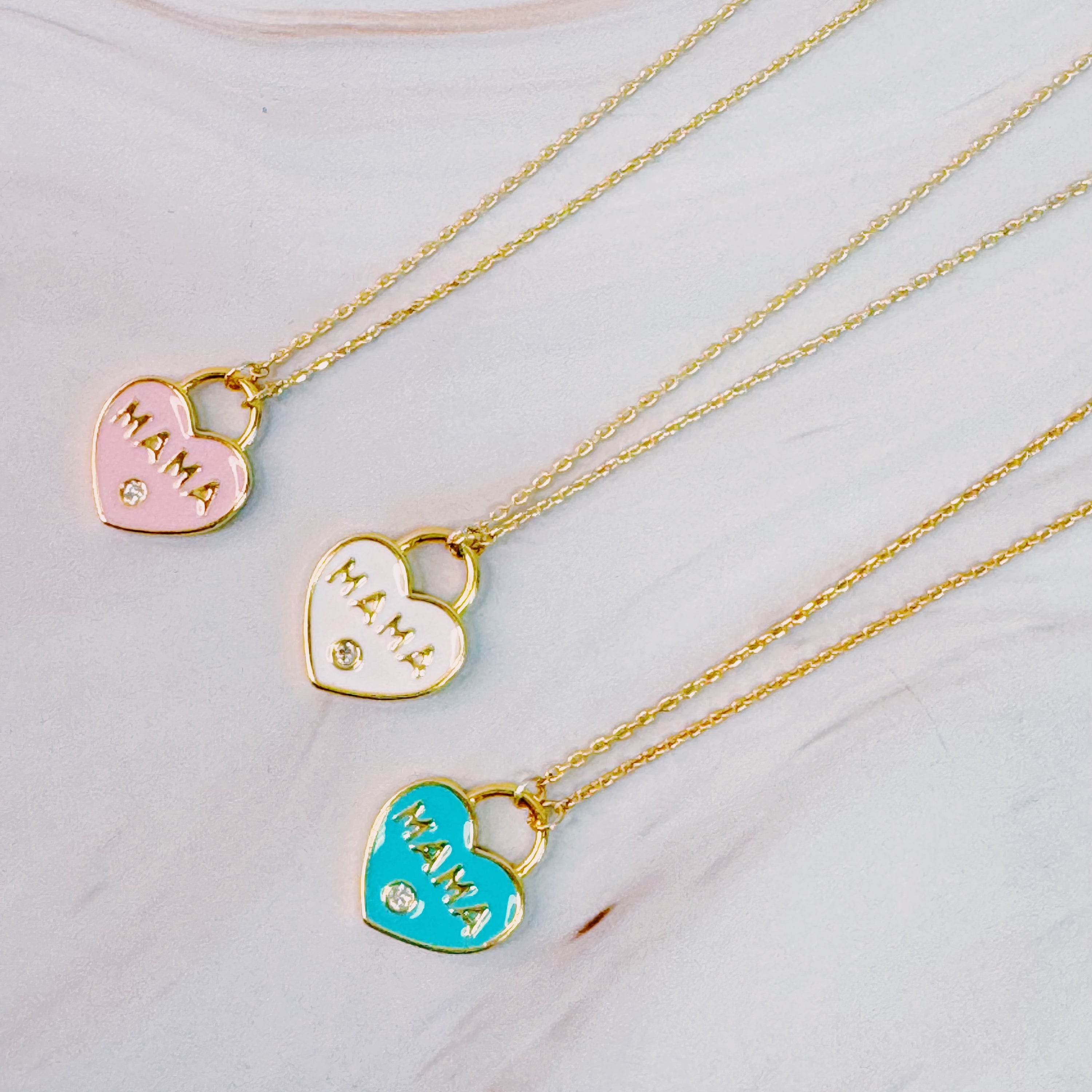 Pastel locket Mama necklace with gold plated brass chain and intricate pendant design, perfect for mothers.