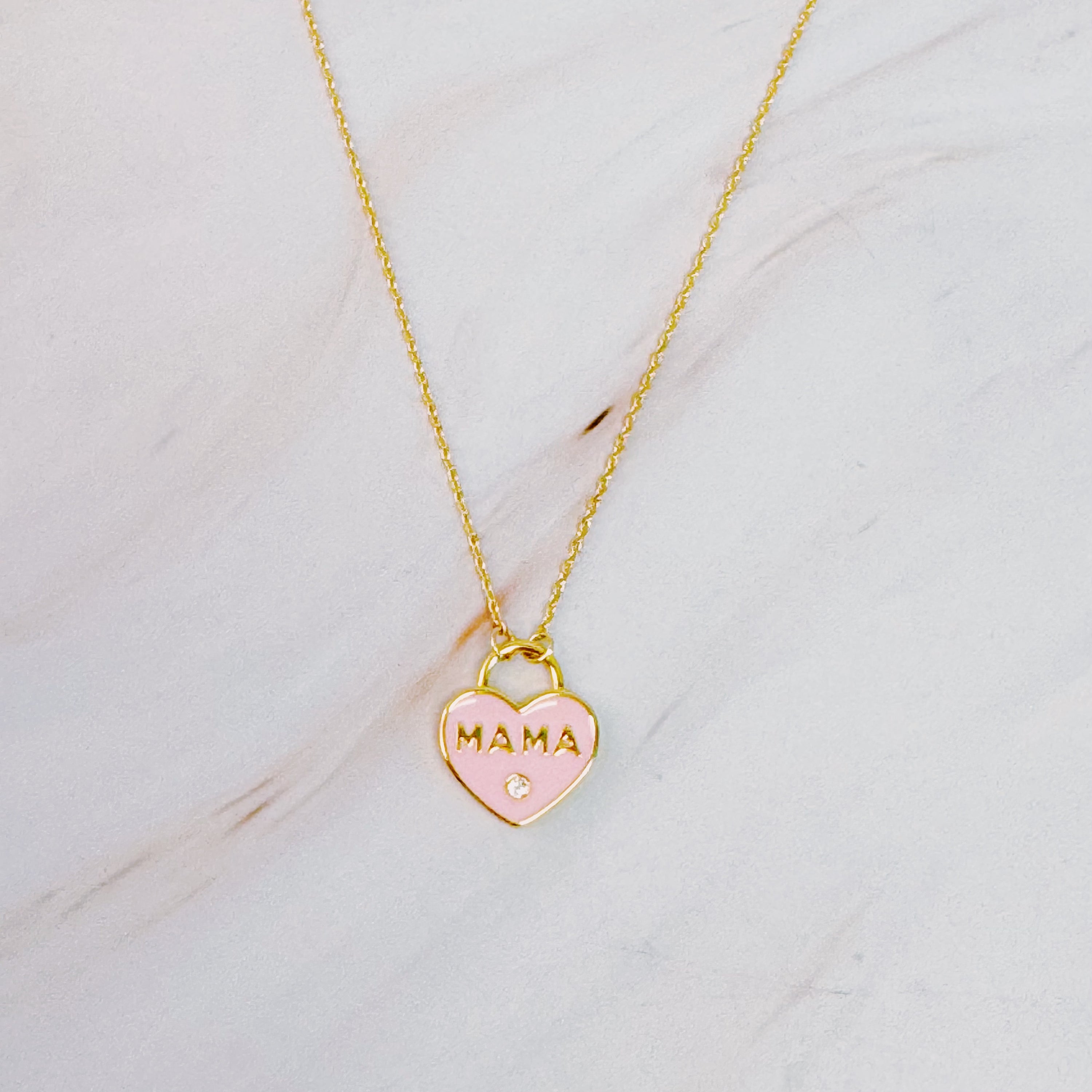 Pastel locket Mama necklace with gold plated brass chain and intricate pendant design, perfect for mothers.