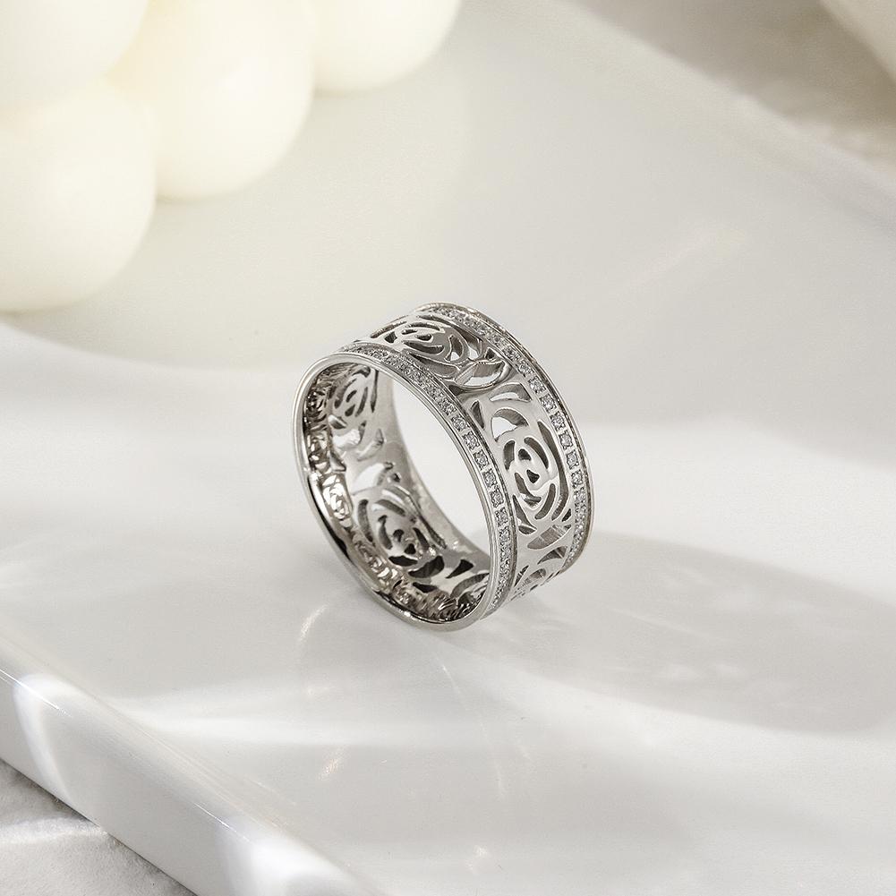 A delicate PAVÉ CZ Flower Ring featuring two rows of sparkling cubic zirconia stones, elegantly designed for everyday wear and special occasions.