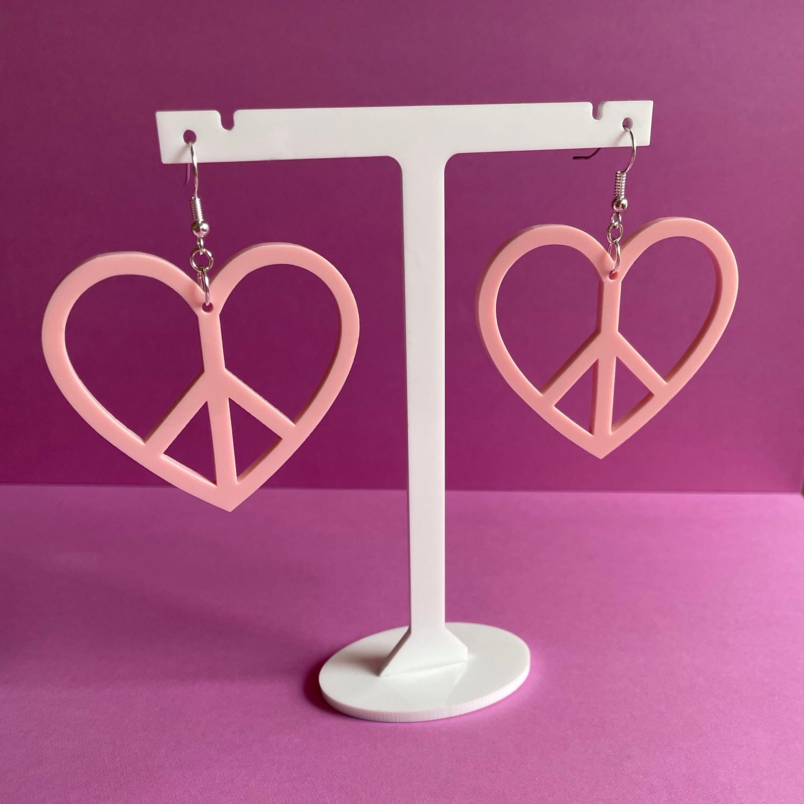 Colorful Peace Heart Earrings made from laser-cut acrylic, showcasing a heart shape with a peace symbol design.