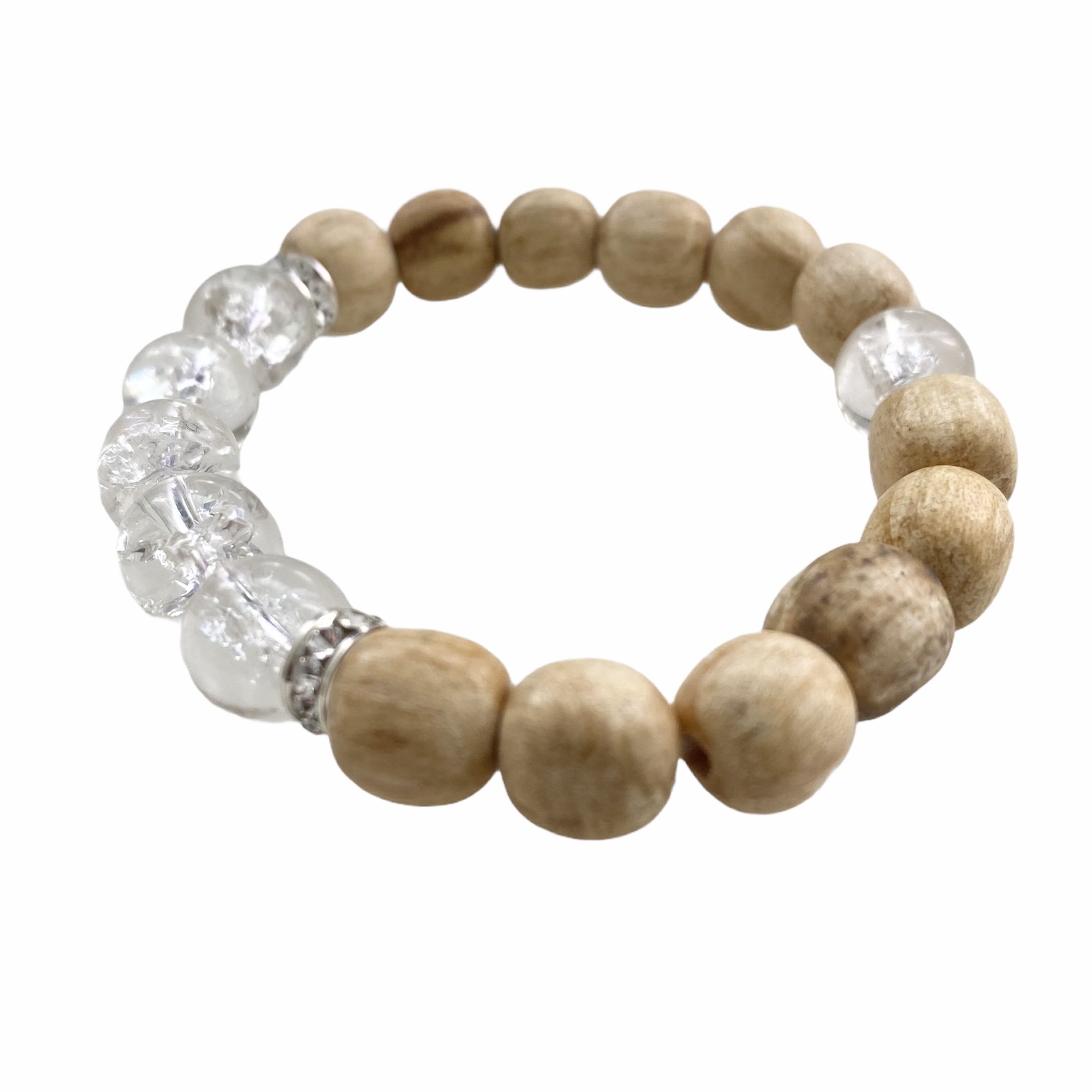 A handmade beaded bracelet featuring 10mm cracked quartz beads and palo santo, designed for meditation and stress relief.