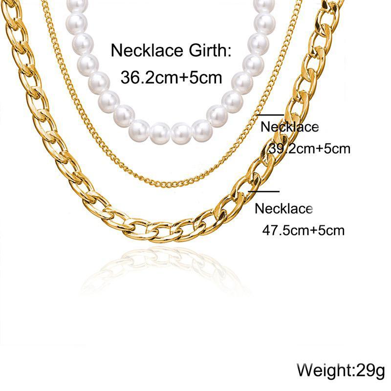 Elegant 18K gold plated necklace featuring pearl and curb link design, adjustable length with lobster clasp closure.