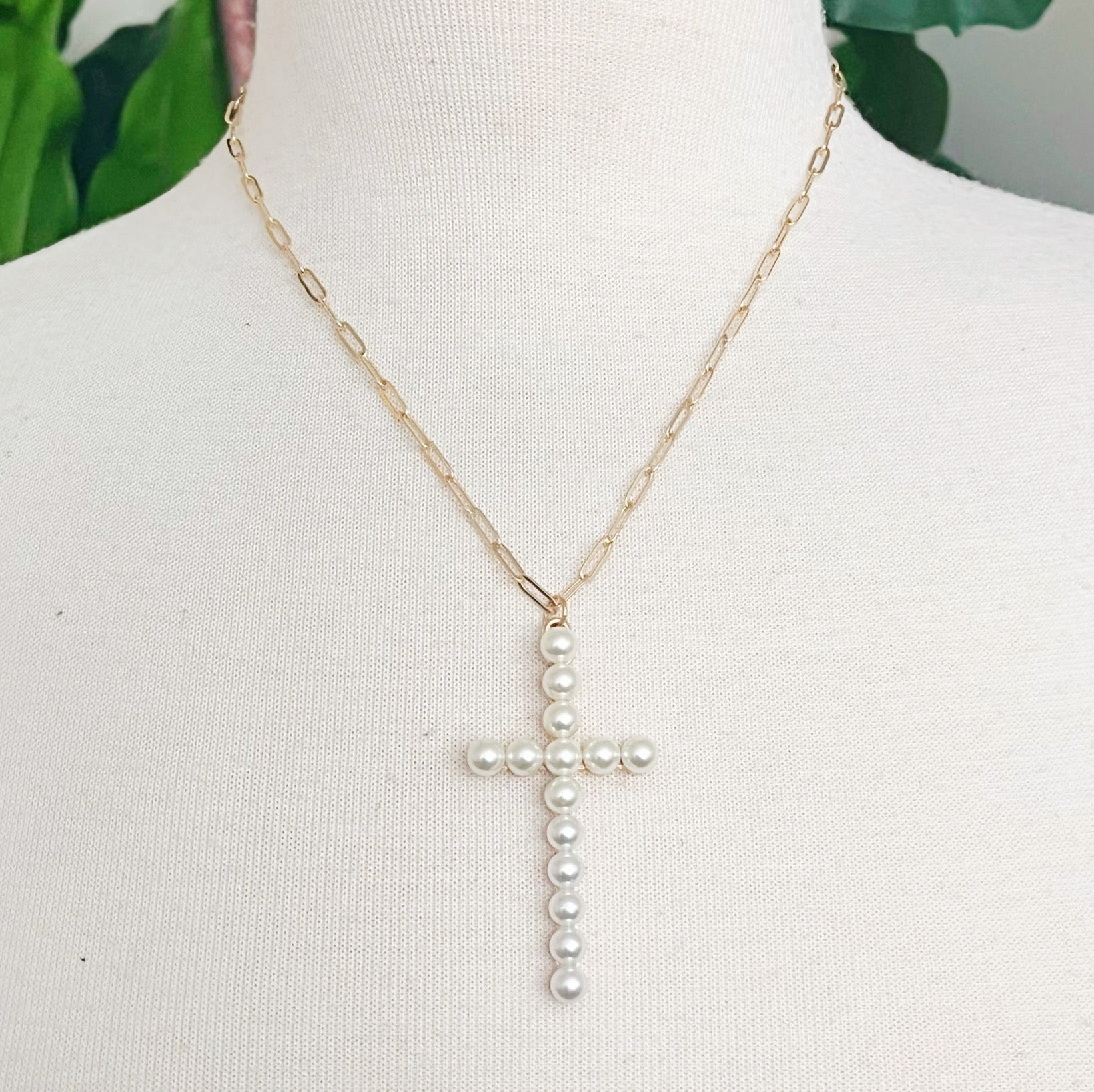 Elegant Pearl Cross Pendant Clip Chain Necklace featuring a bold pearl cross and slim link chain, perfect for everyday wear.